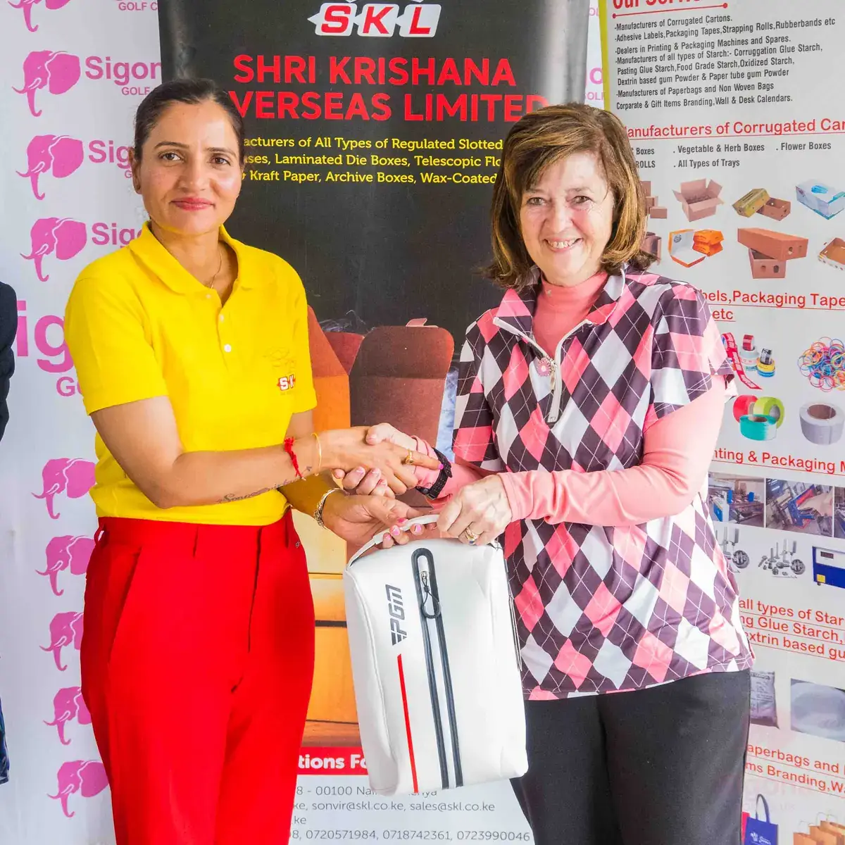 SKL banners and a table of golf bags and holdall prizes at the Sigona Golf Club Ladies Pendant prize-giving - 4